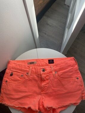 AG Adriano Goldschmied Neon Coral Low-Rise Denim Shorts